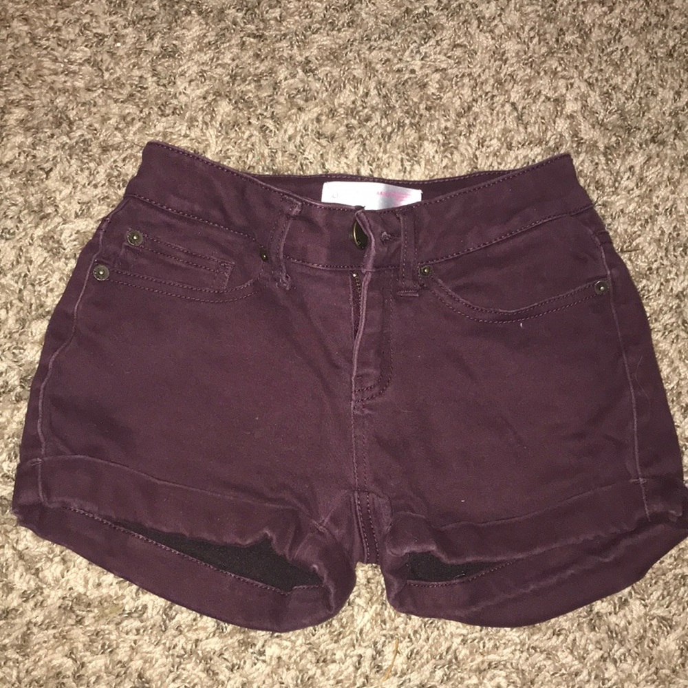 Mid rise eggplant shorts. In good condition.